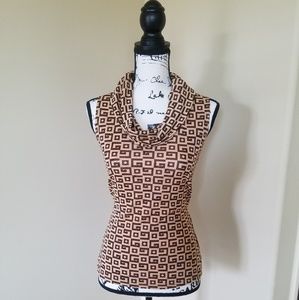 Sleeveless cowl neckline.